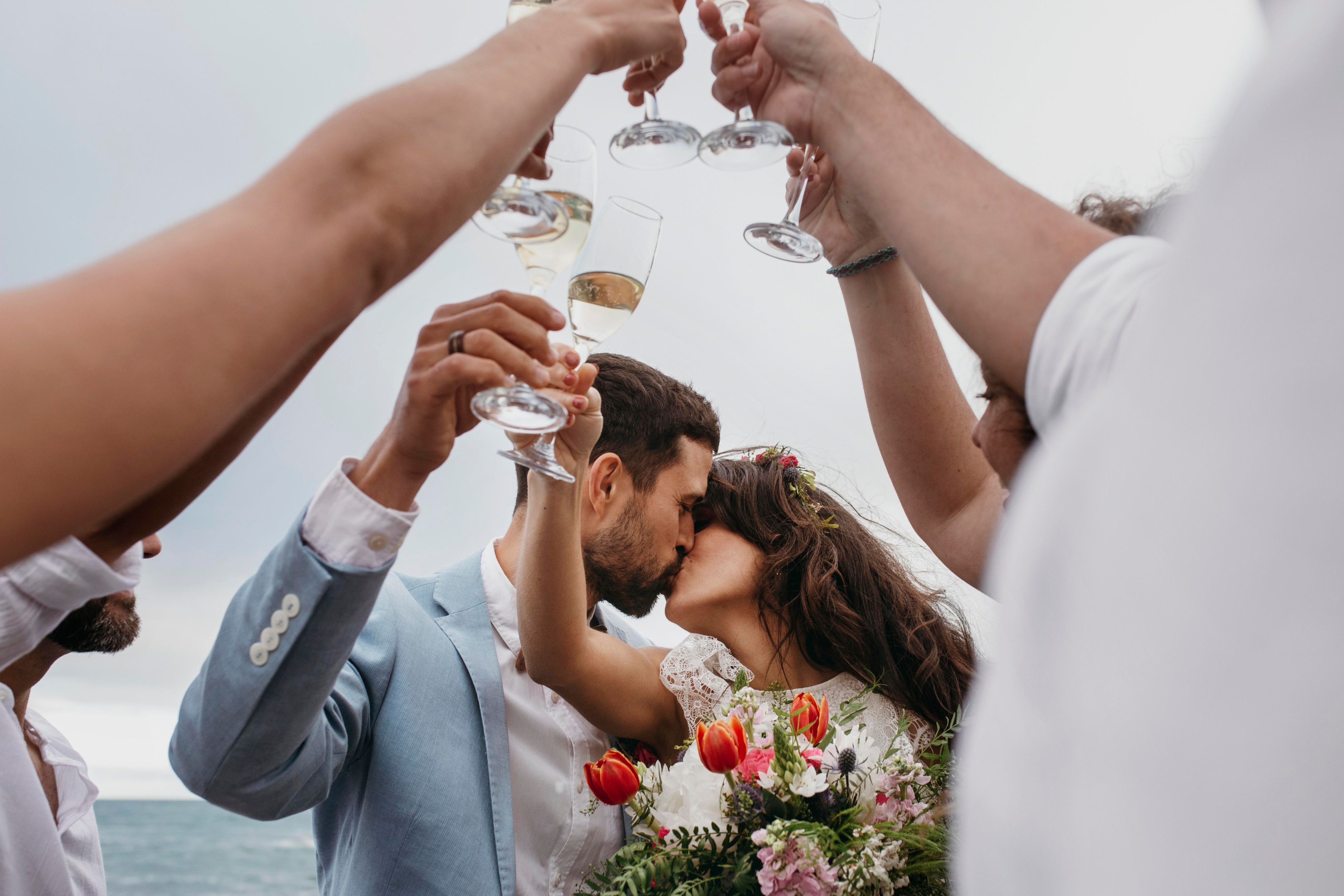 Wedding toast with champagne at sea